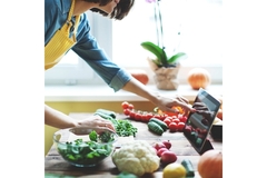 Image Woman cooking.
